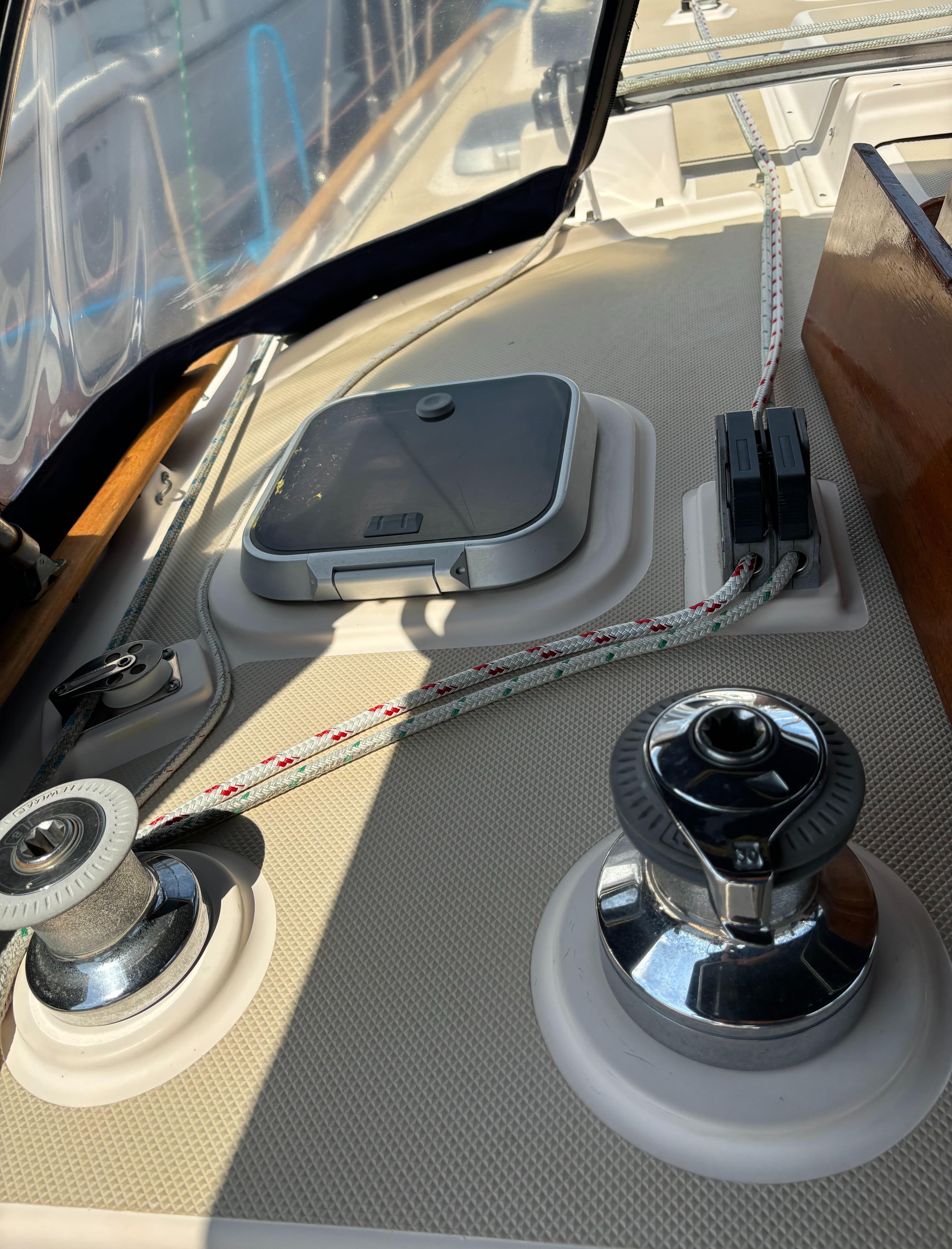 Deck of 1995 Island Packet 40 sailboat with winches and hatch.