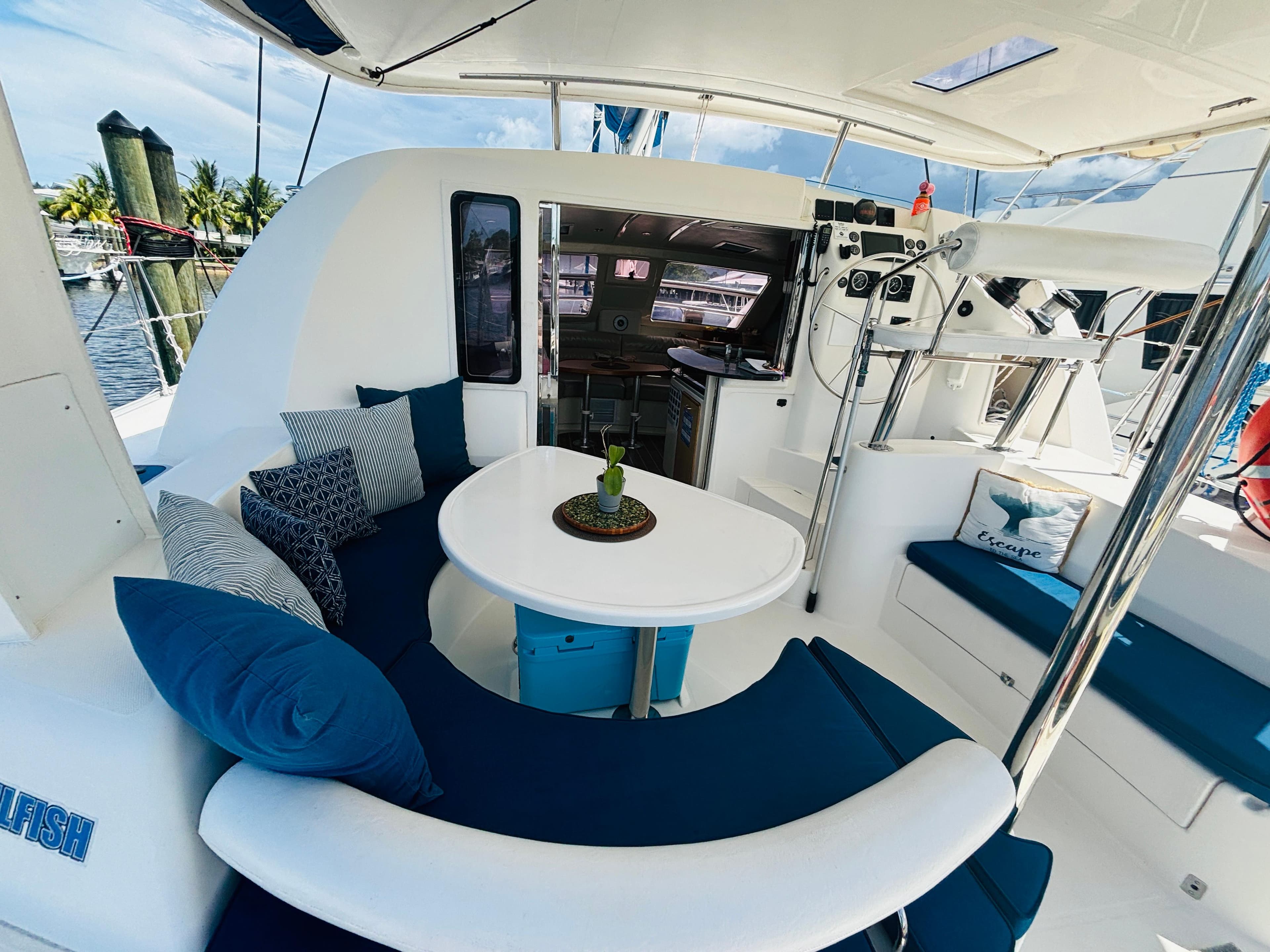 Luxurious 2006 Leopard 40 catamaran interior with cozy seating and elegant decor.