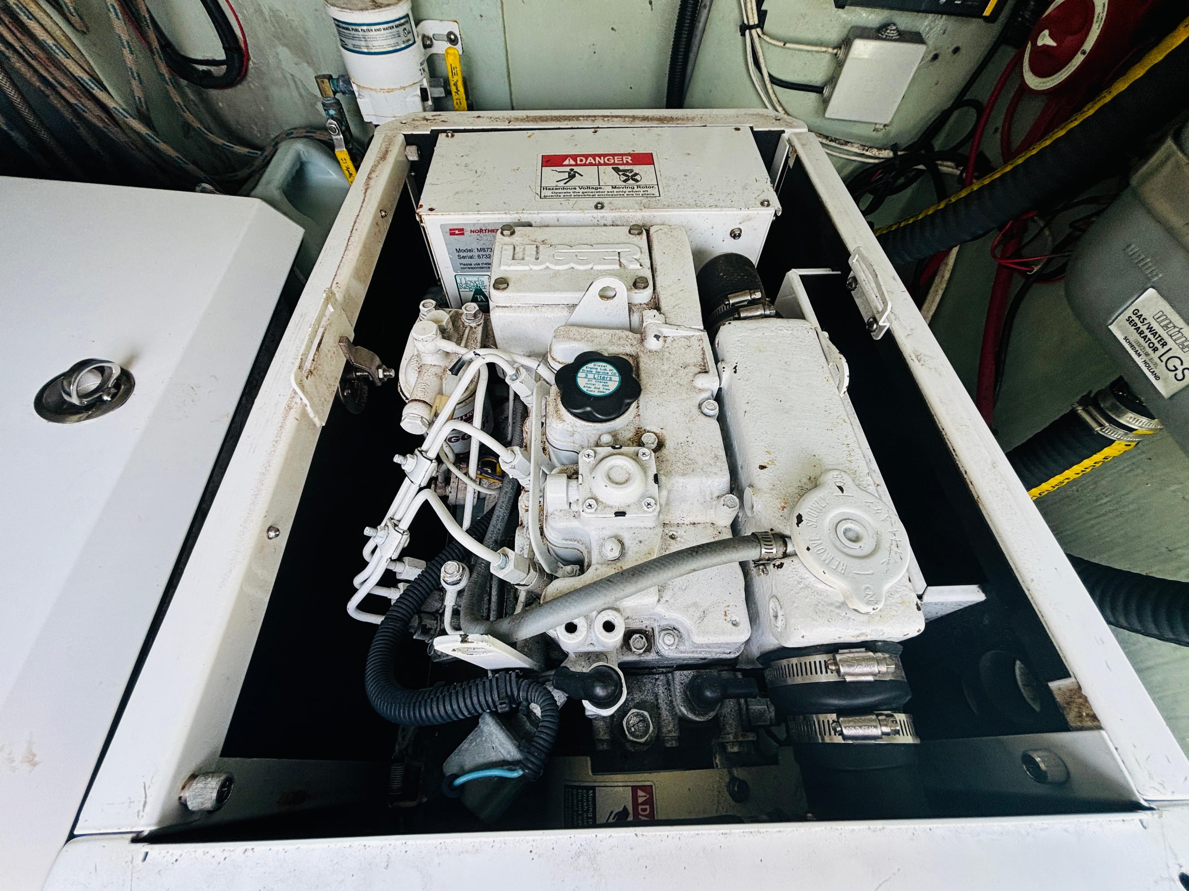 Engine compartment of a 2006 Leopard 40, showcasing mechanical components and wiring.